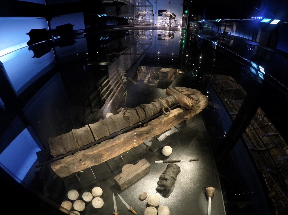 The view of Tudor artefacts through the glass floor at the Mary Rose Museum